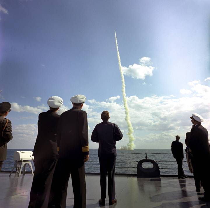 28. President John F. Kennedy observes the firing of a Polaris missile by the submerged nuclear submarine Andrew Jackson, off the coast of Florida, November 16, 1963. He was assassinated six days later
