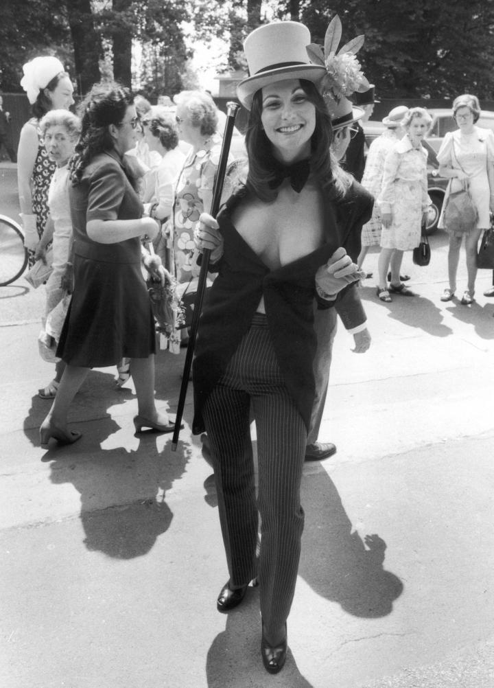 19. Pornstar Linda Lovelace shocks other race-goers as she attends the Royal Ascot races in a revealing morning suit, England, 1974