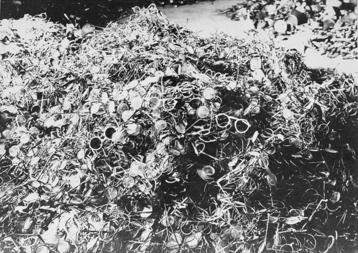 20. Eyeglasses taken from the Auschwitz prisoners before they were taken to the gas chamber. Found after the liberation, piled up in the six remaining warehouses at the camp. 1945