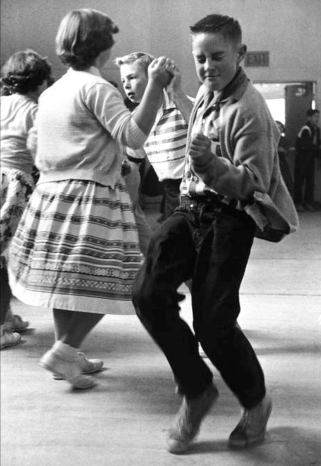27. Lost in the moment at a school dance (1950).