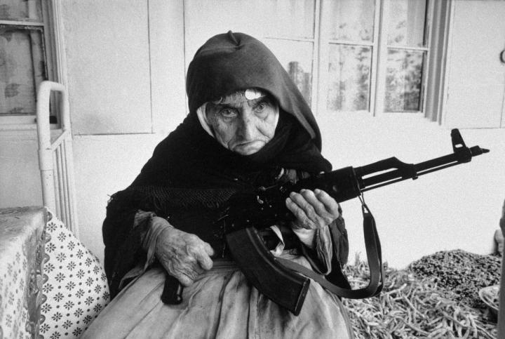 4. 106 year old Armenian woman guards her home in southern Armenia in 1990.