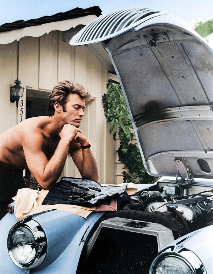 16b. Clint Eastwood working on his 1958 Jag XK 120 in 1960