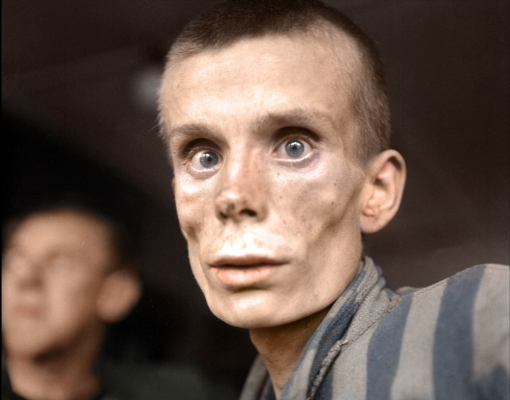 1. 18 year old Russian boy being liberated from Dachau, (April 1945)
