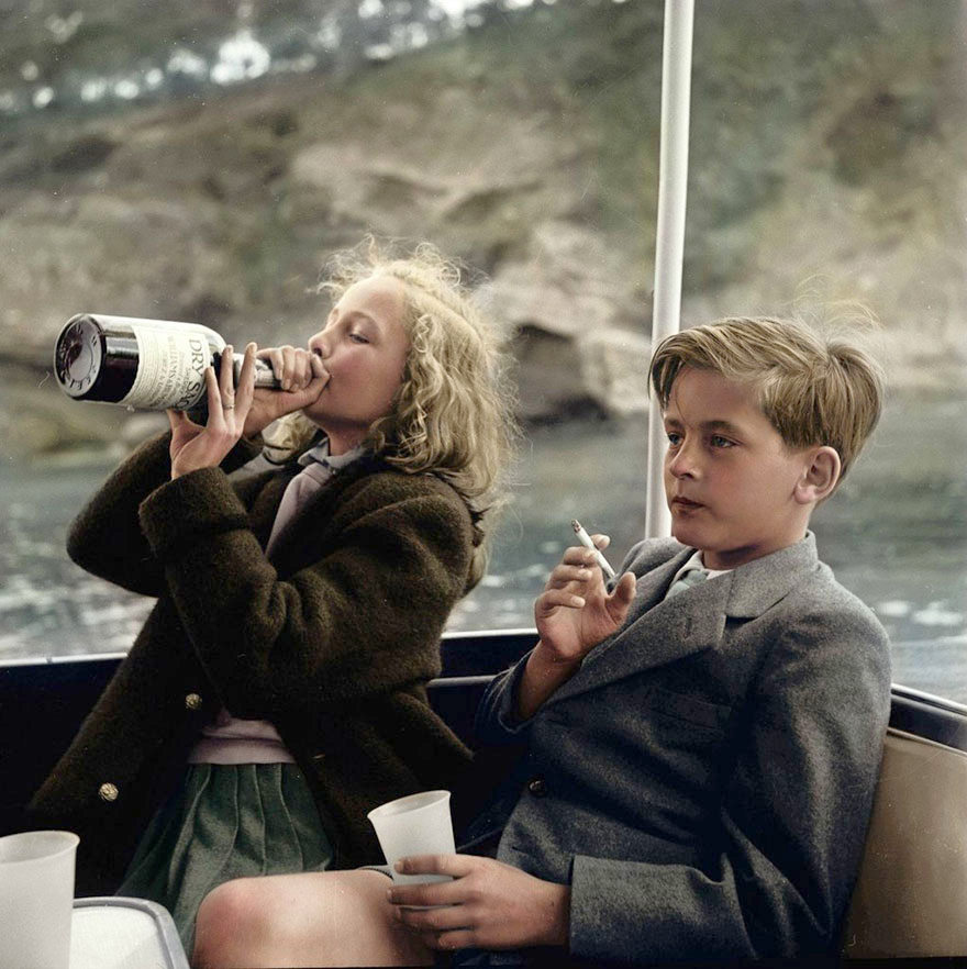 4. Princess Yvonne (13) and Prince Alexander (12) Sayn-Wittgenstein-Sayn take drink and smoke on yacht near Majorca