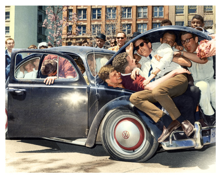 6. College students pile into a Volkswagen Beetle, (c. 1965)