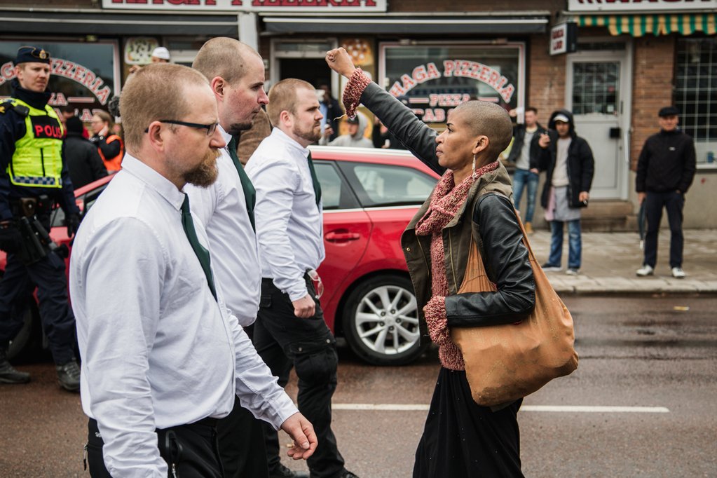 5. Swedish woman Maria-Teresa Asplund standing alone in confronting hundreds of Neo-Nazi marschers, Sweden 2016