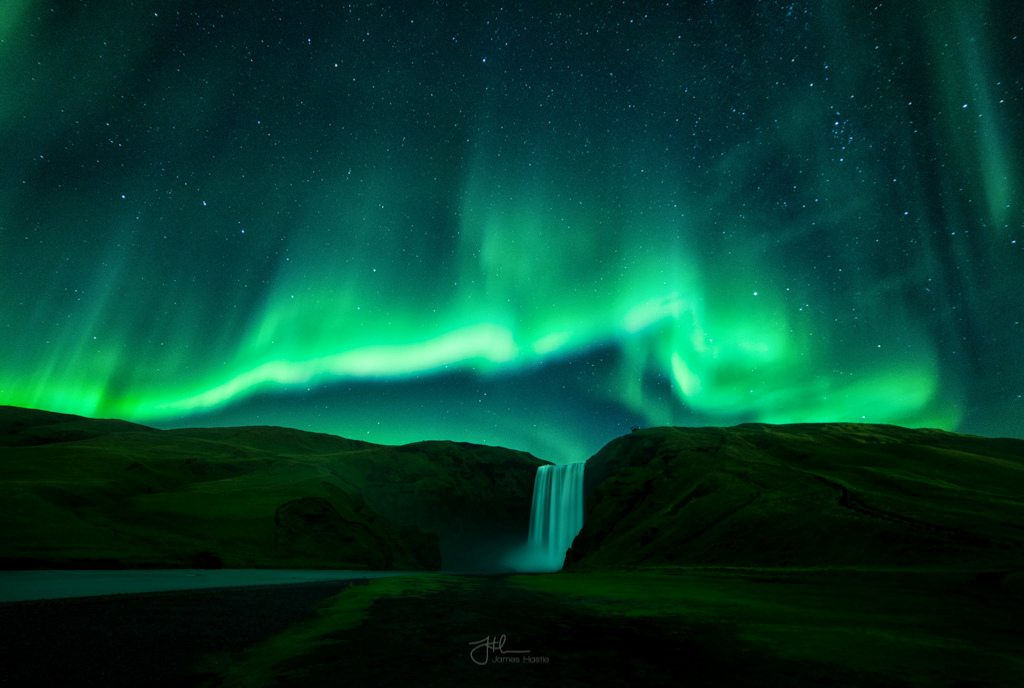 7. Aurora at the Skogafoss waterfall, Iceland