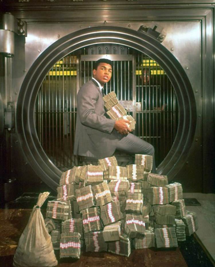 1. Muhammad Ali with his winnings in 1964.