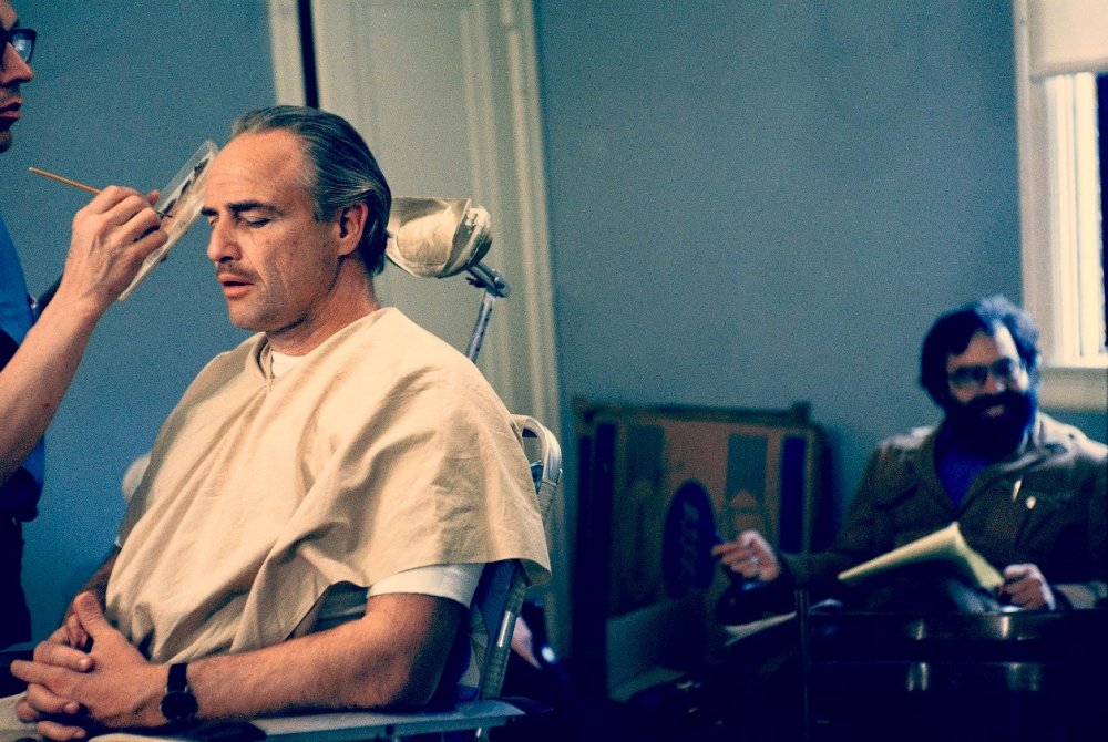 34. Marlon Brando getting ready for his shot during the filming of The Godfather 1972