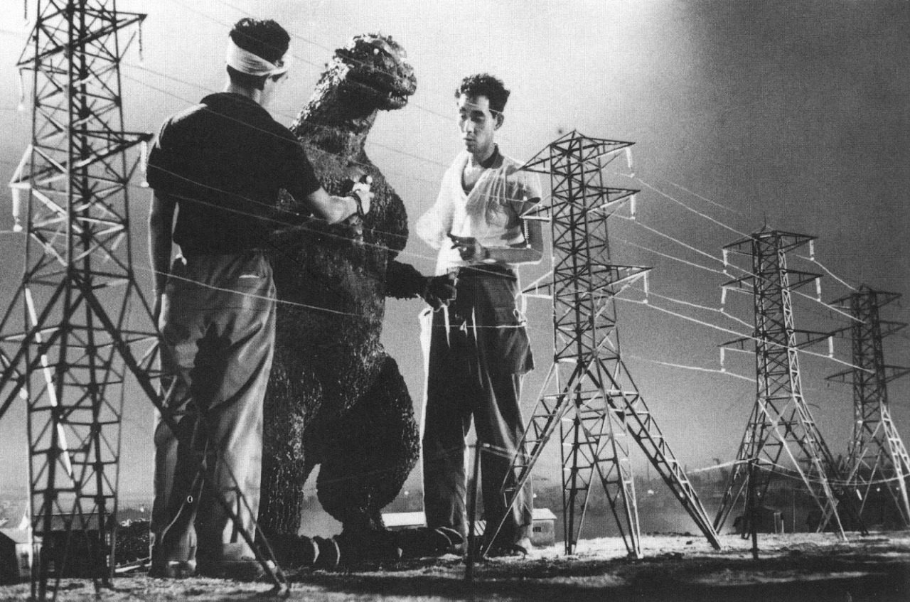 37. Preparing models and set to film the first 'Godzilla' movie, 1954 on the sets of Godzilla
