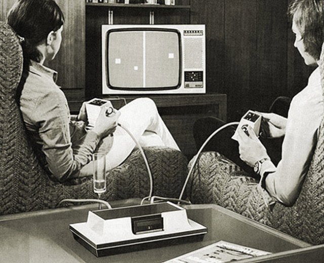 4. Early Video Gamers playing at home on a Magnavox Odyssey, circa 1972